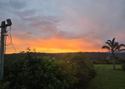 Sunset over Farm21 Ecoresort with golden sky